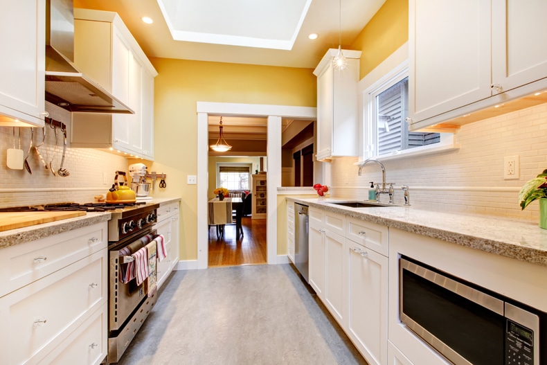 yellow wall color for white kitchen cabinets