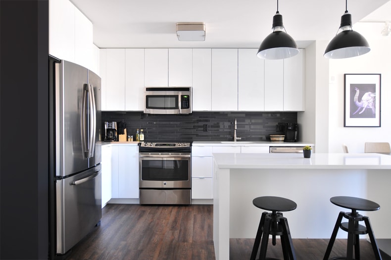 black kitchen wall paint with white cabinets