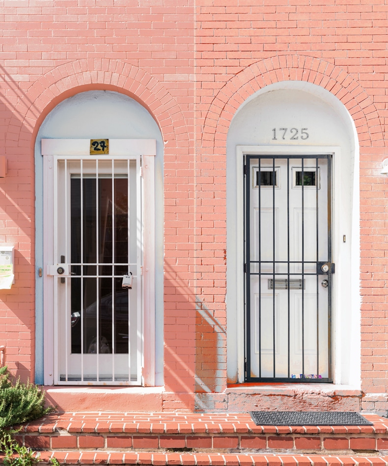 red brick front door white color