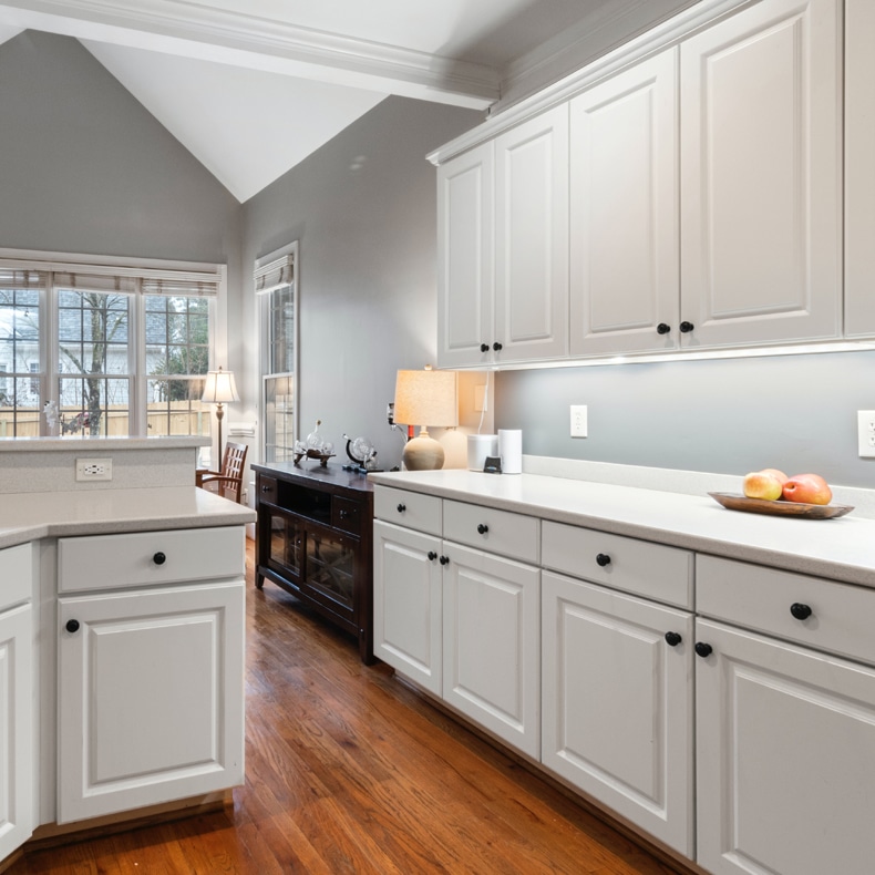 A Monochrome Marvel: White Cabinets with Black Knob Magic! - Quiet Minimal