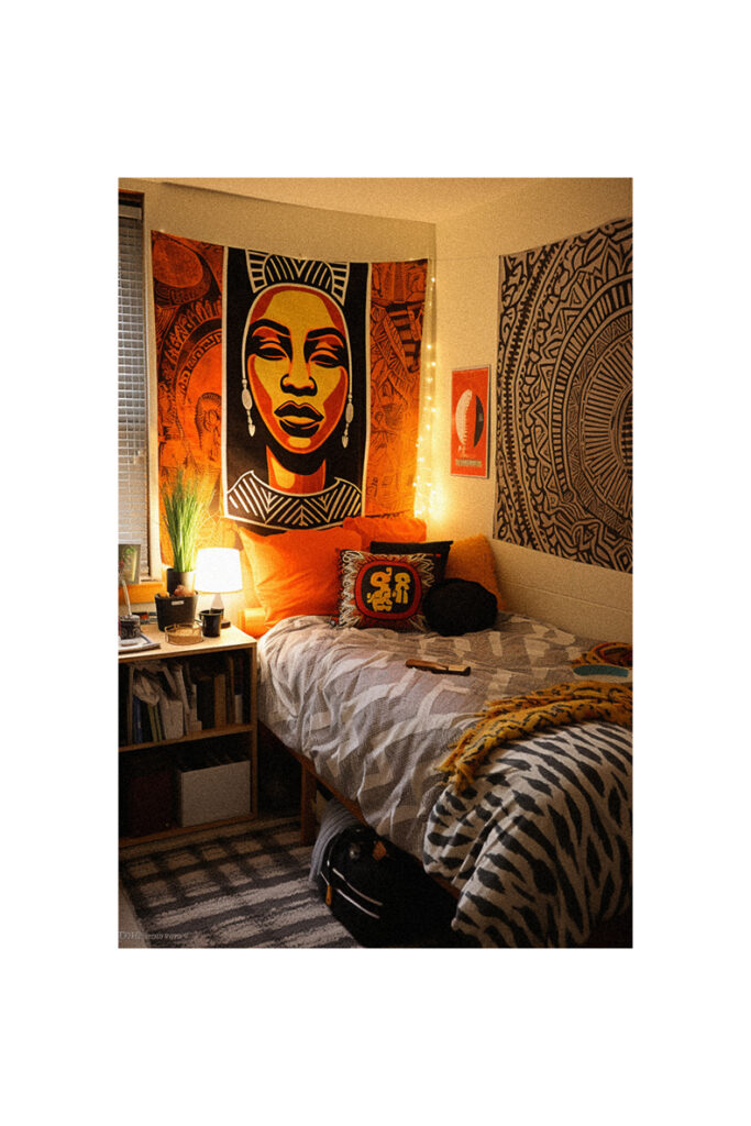 A bed in a HBCU dorm room with a painting on the wall.