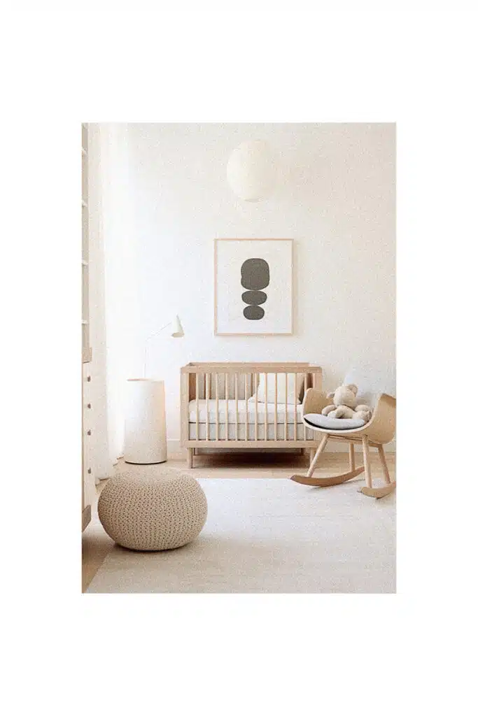 A white furniture and crib nursery room for baby inspiration.