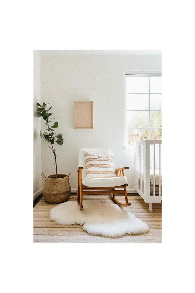 Nursery room inspiration with a rocking chair and a sheepskin rug.