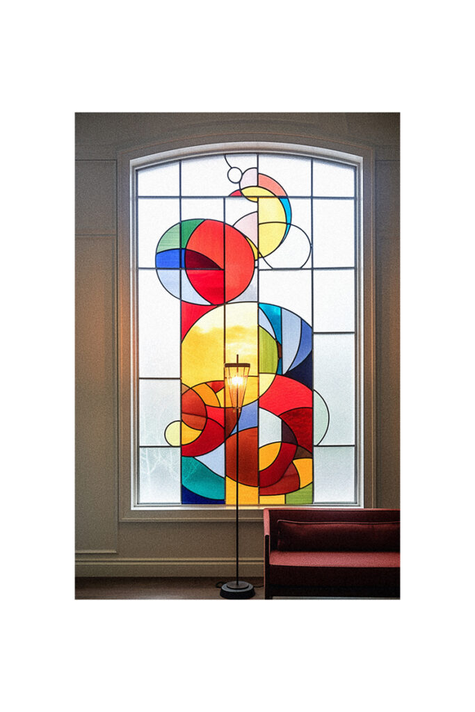 A beautiful stained glass window in a church showcasing intricate art.