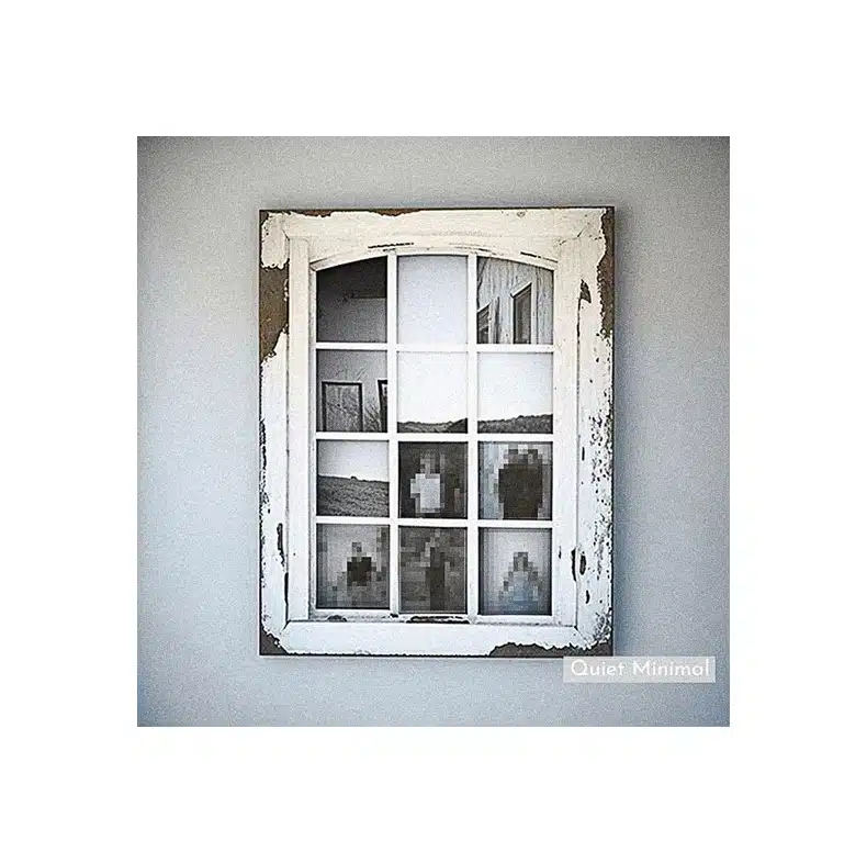Repurposed vintage window frame featuring a family portrait.