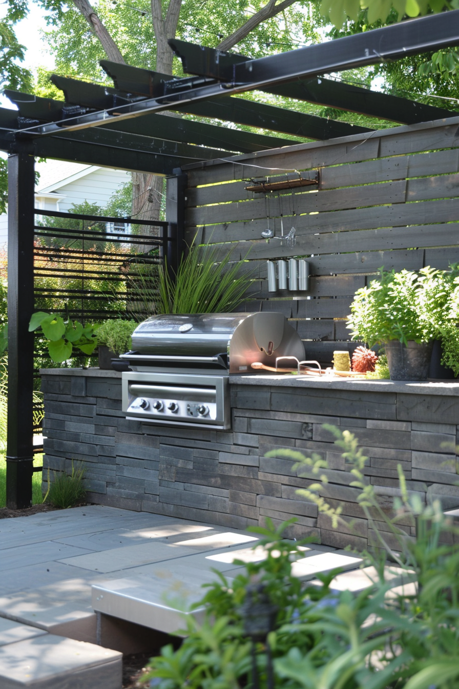 Outdoor kitchen with a modern grill and countertop surrounded by greenery in a backyard setting.