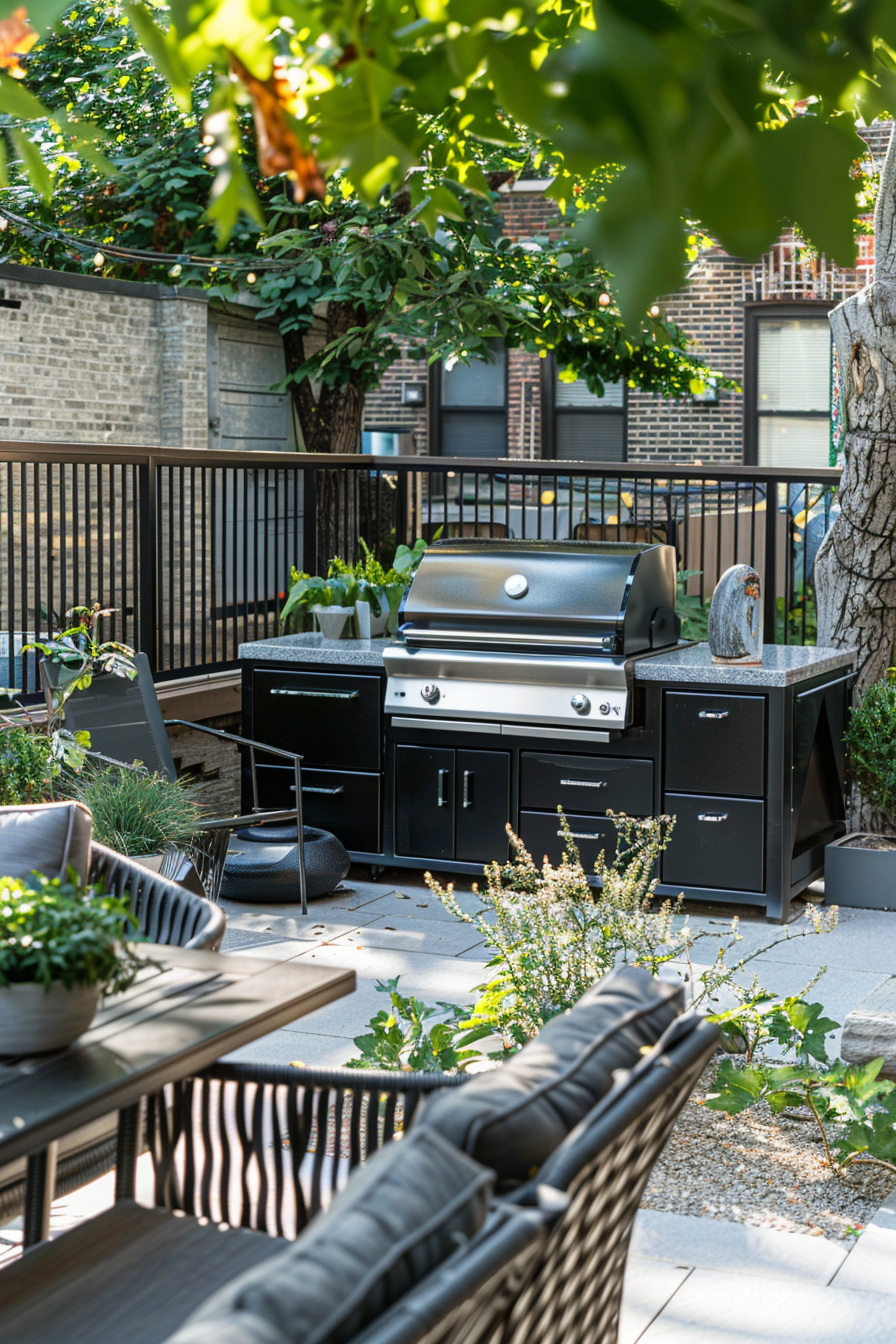 Outdoor patio with a modern barbecue grill, seating area, and potted plants, set against a backdrop of green foliage.