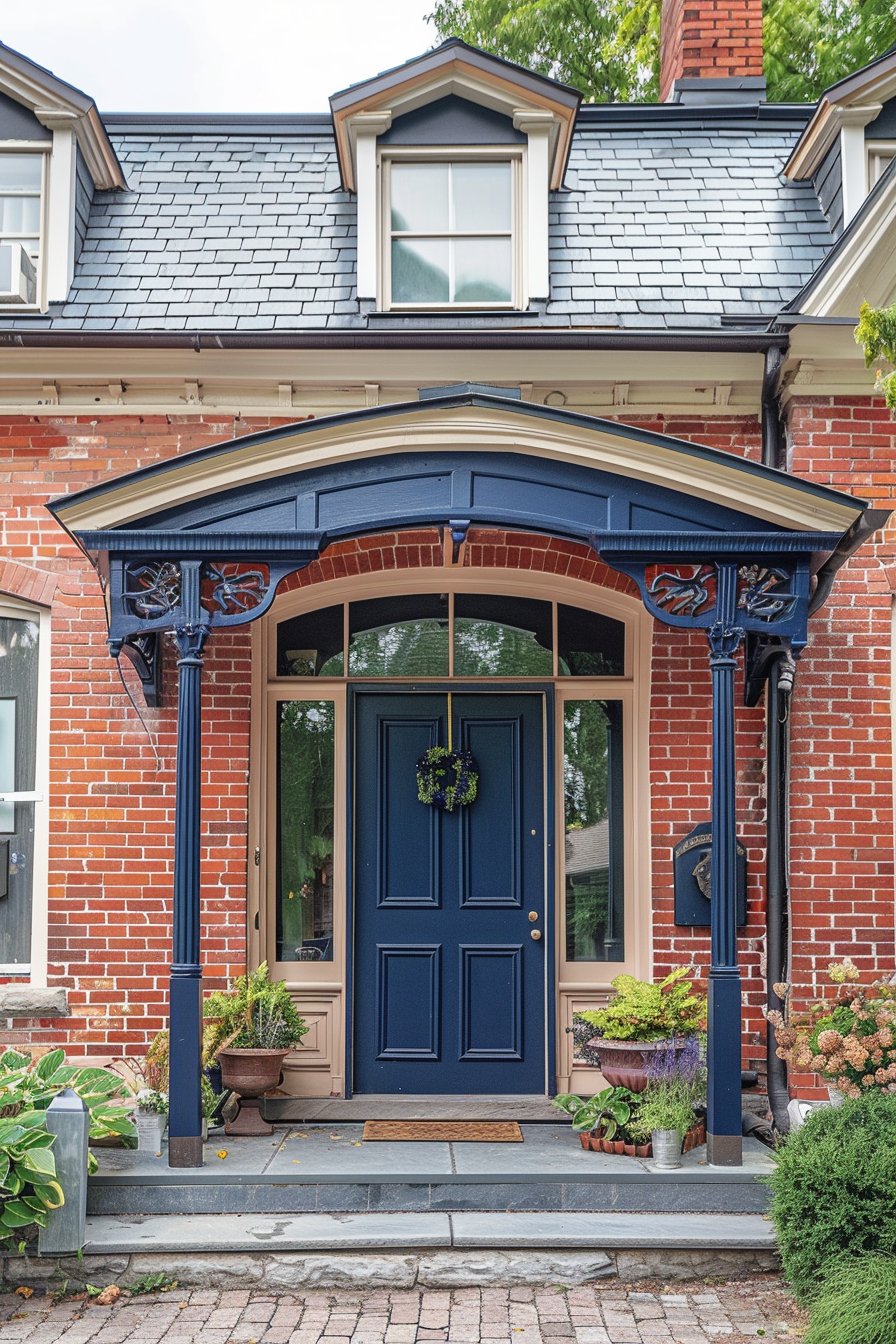 A charming entrance with a navy blue door framed by a beige arch and brick walls, complete with a small decorative wreath.
