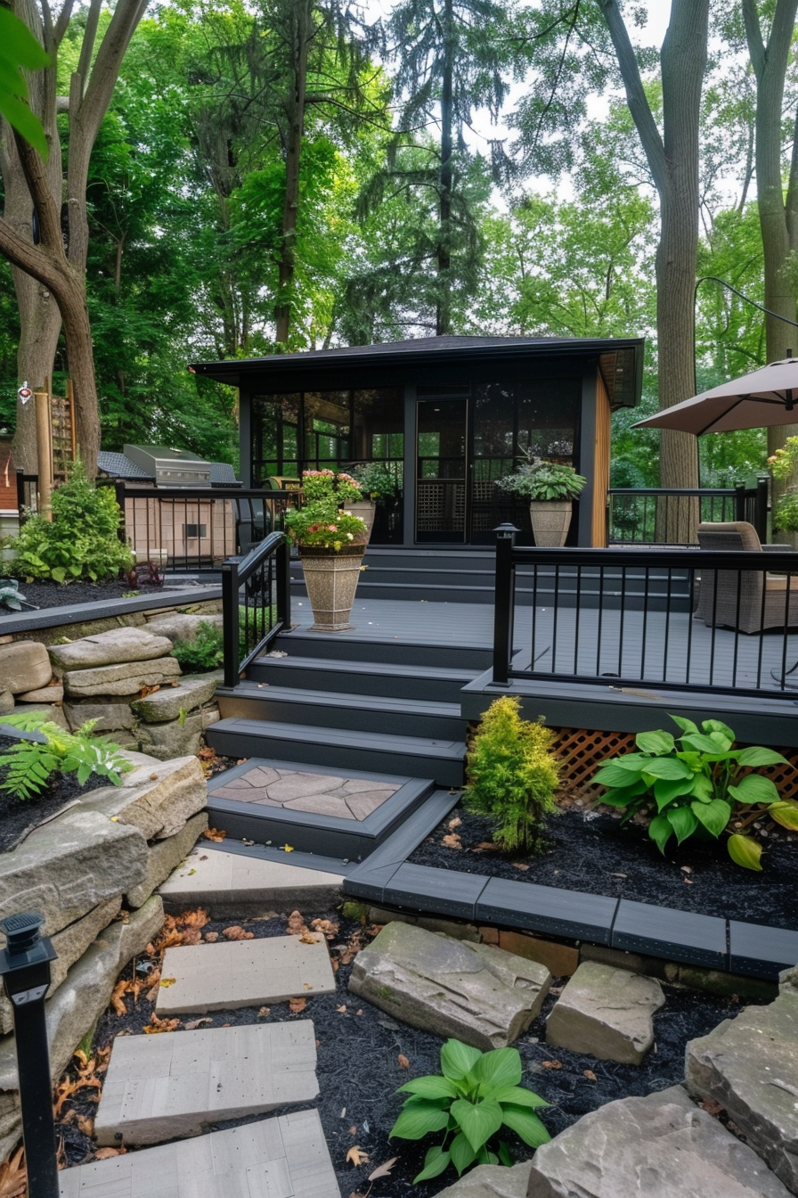 Modern house with a spacious deck, black railing, stone steps, and surrounding greenery.