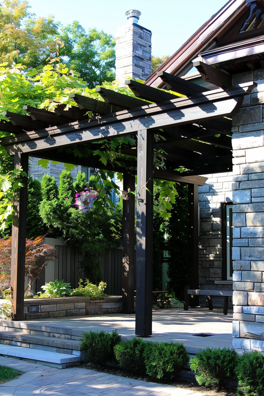 Elegant house entrance with a pergola shaded pathway, lush greenery, and stone accents under a clear blue sky.
