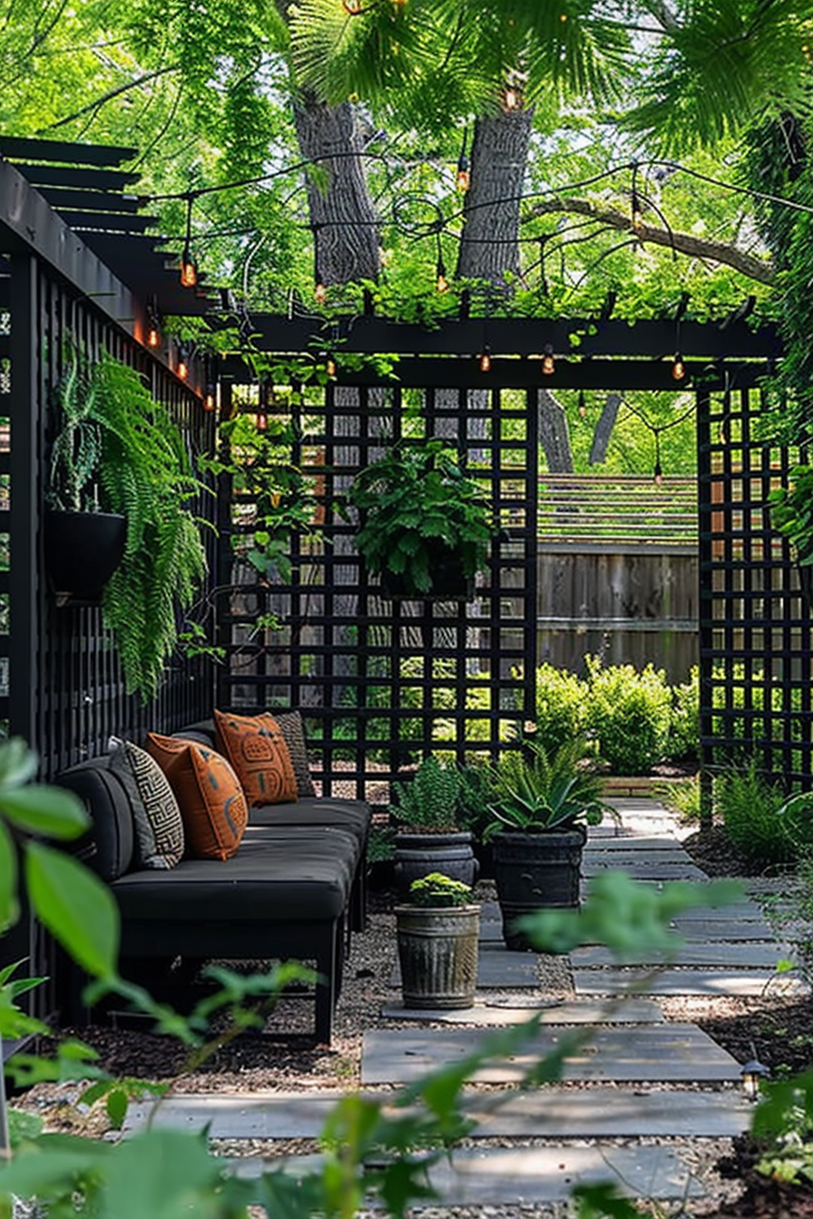 ALT Text: "Cozy garden nook with black furniture and lattice, adorned with festoon lights, lush plants, and stone pathway leading through greenery."