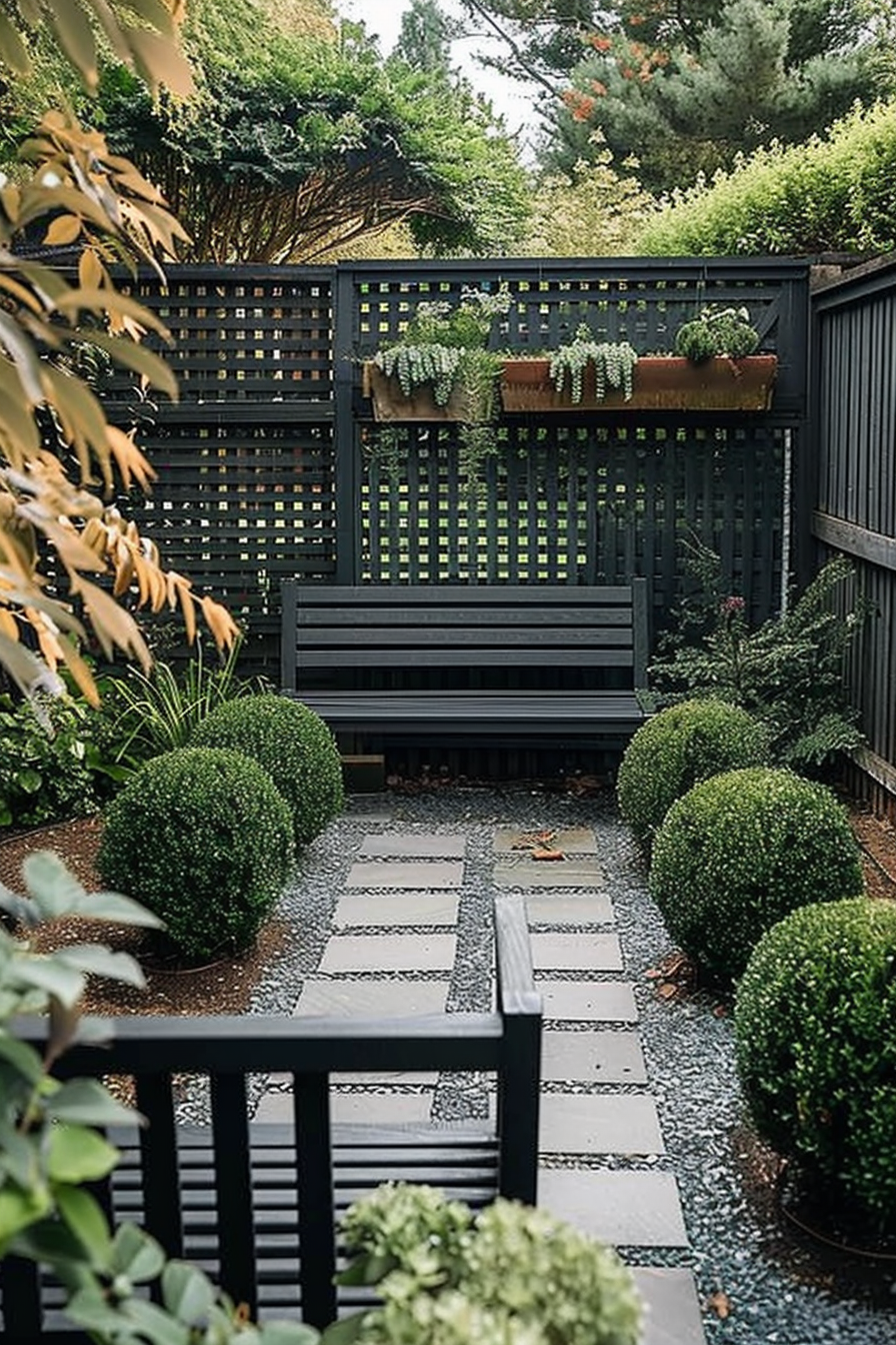 A serene garden path with square stepping stones, surrounded by manicured bushes and a dark lattice fence with a bench and hanging plants.