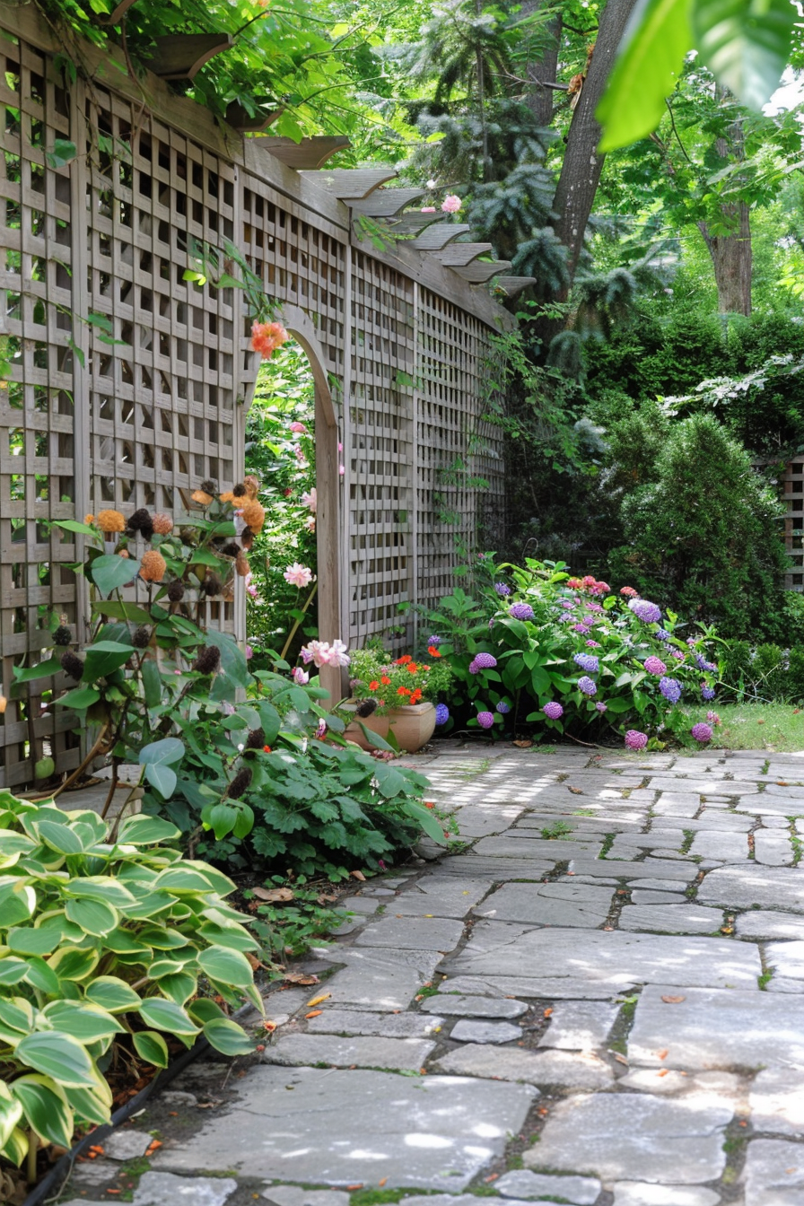 A serene garden pathway with a lattice arch, surrounded by lush greenery and vibrant flowers.