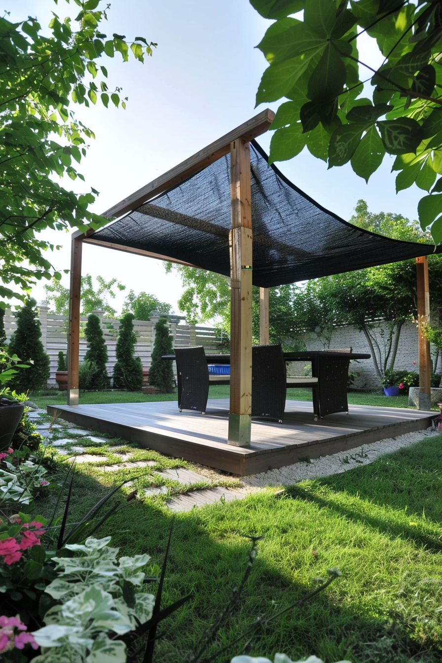 A wooden pergola with a shade cloth covers a deck with modern outdoor furniture in a lush garden setting.