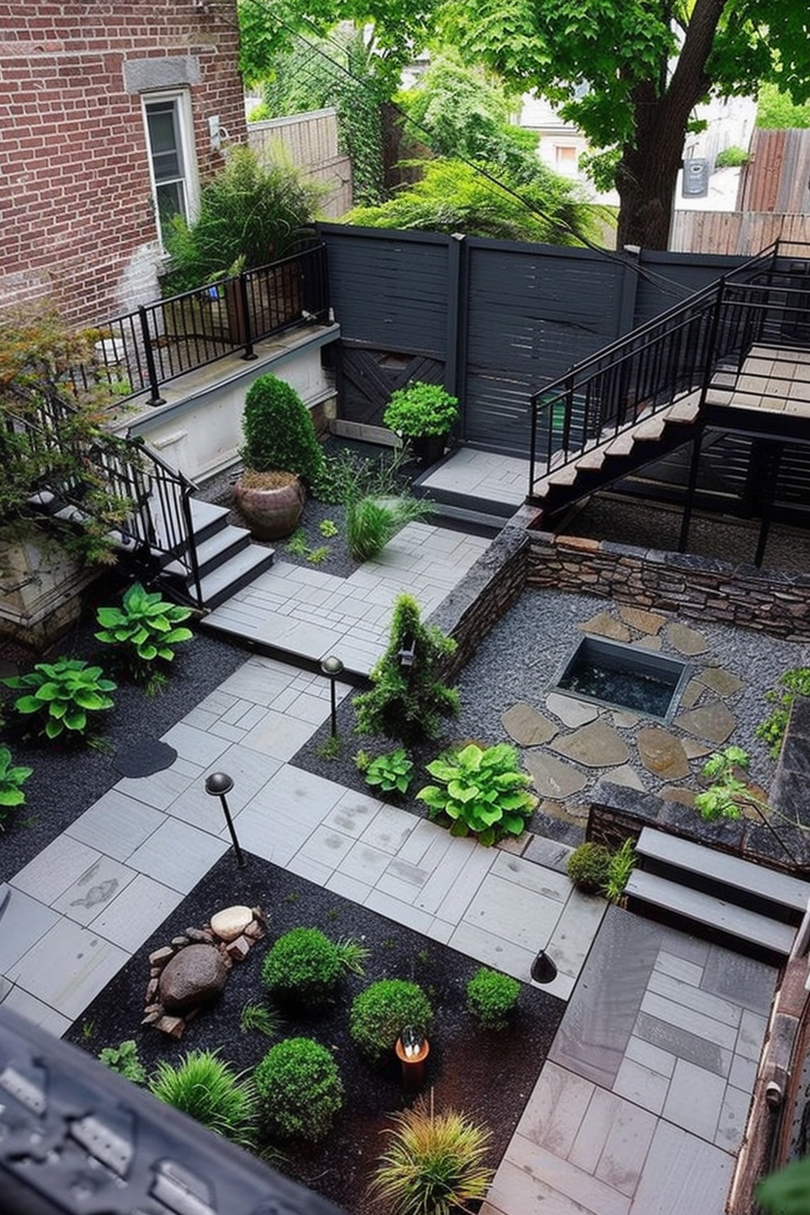 Aerial view of a cozy urban backyard garden with potted plants, stone paths, and stairs leading to a black fence and entrance.