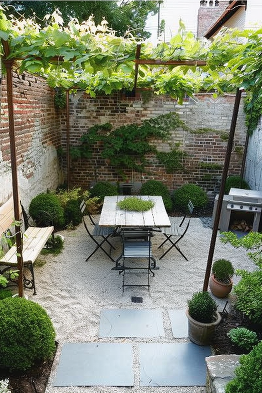 A cozy outdoor seating area with a table and chairs under a pergola with climbing vines, surrounded by brick walls and greenery.