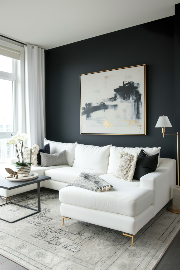 Modern living room with a black wall, white sectional sofa, abstract art piece, and chic accents.