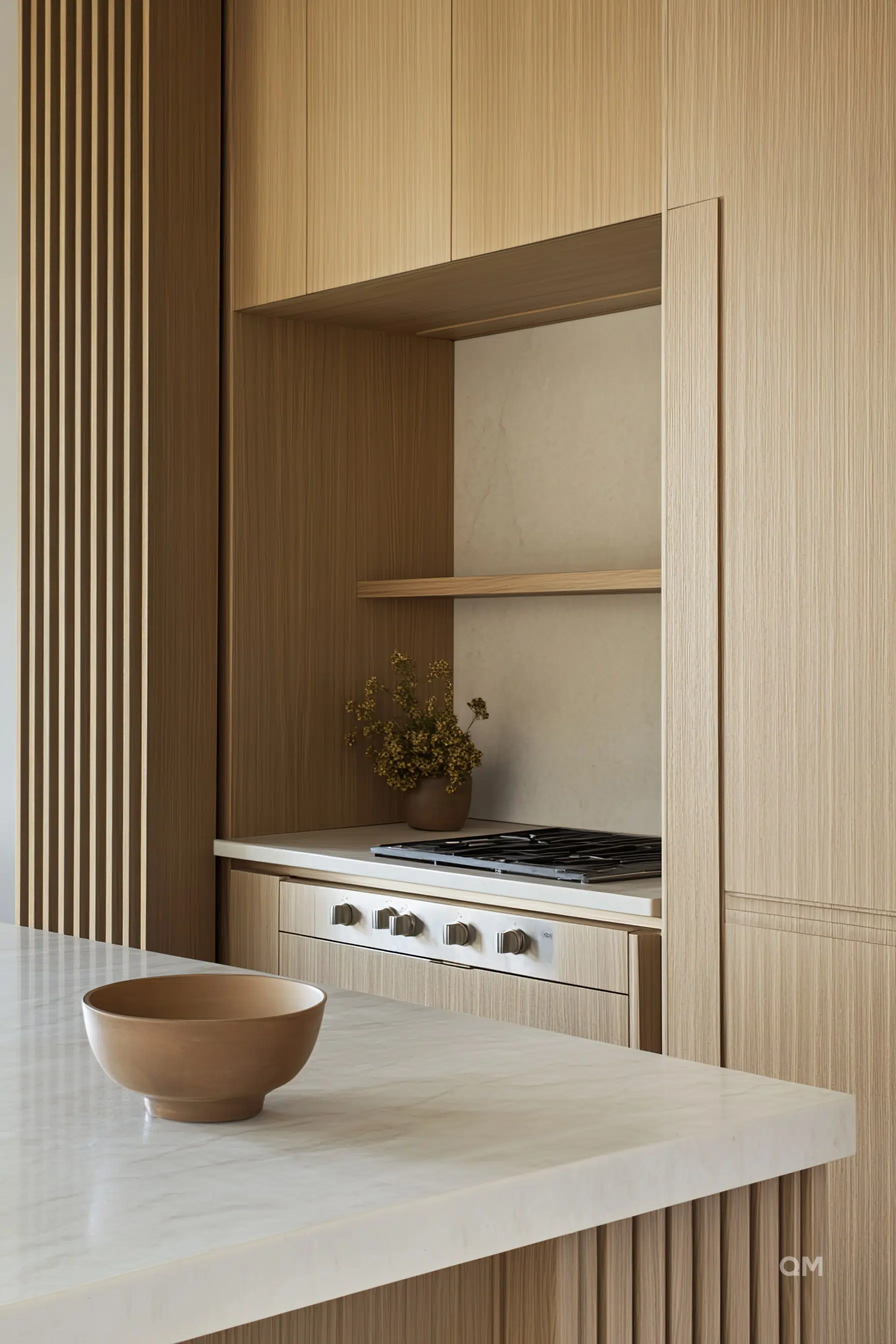 Modern kitchen interior with wooden design, gas stove, and a brown ceramic bowl on marble countertop. Modern kitchen interior with wooden design, gas stove, and a brown ceramic bowl on marble countertop.
