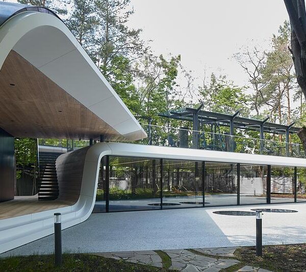 A Forest Garage Built Like a Sculpture for a Car Collection