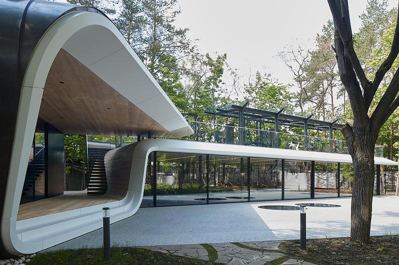 A Forest Garage Built Like a Sculpture for a Car Collection
