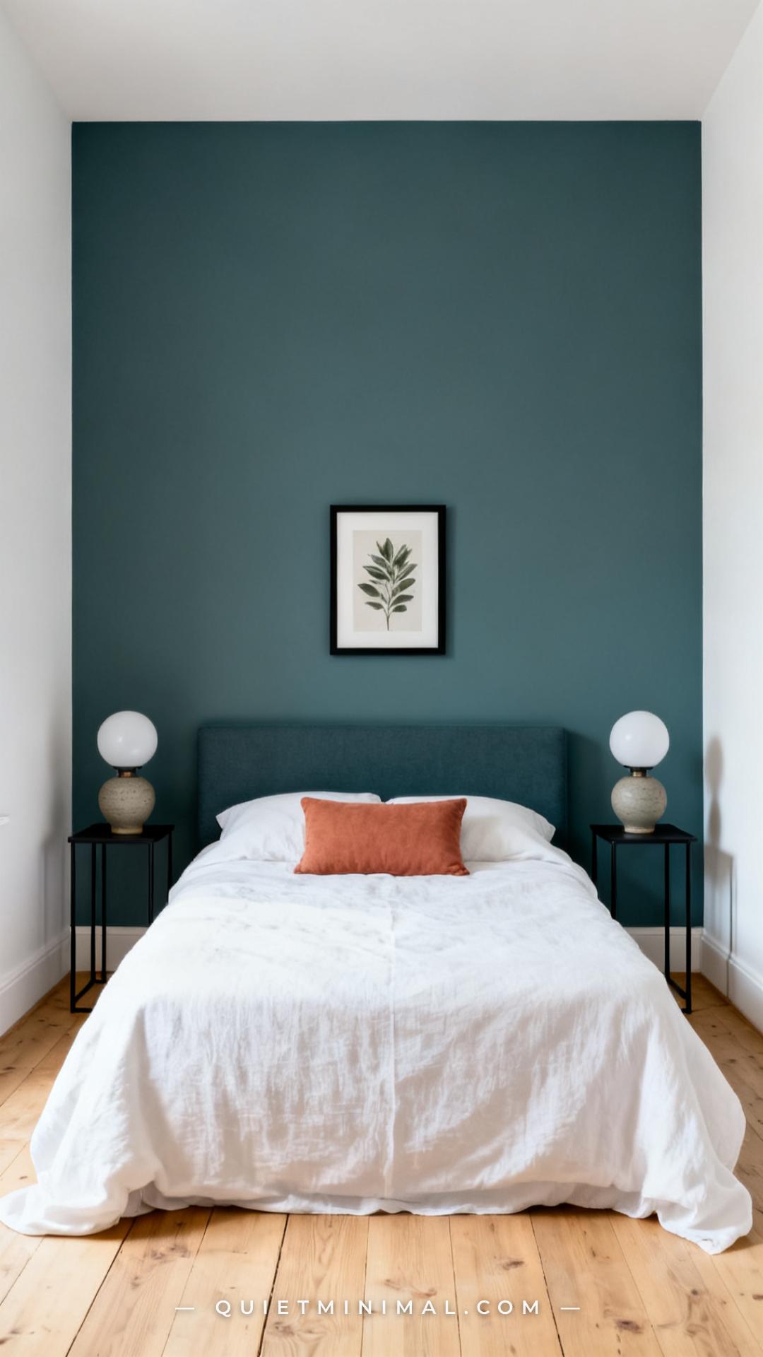 A wide vertical photograph establishes the full headboard wall of a bedroom painted in a deep