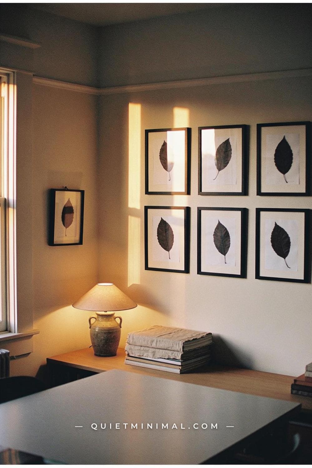 A wide establishing shot from across a study or home office