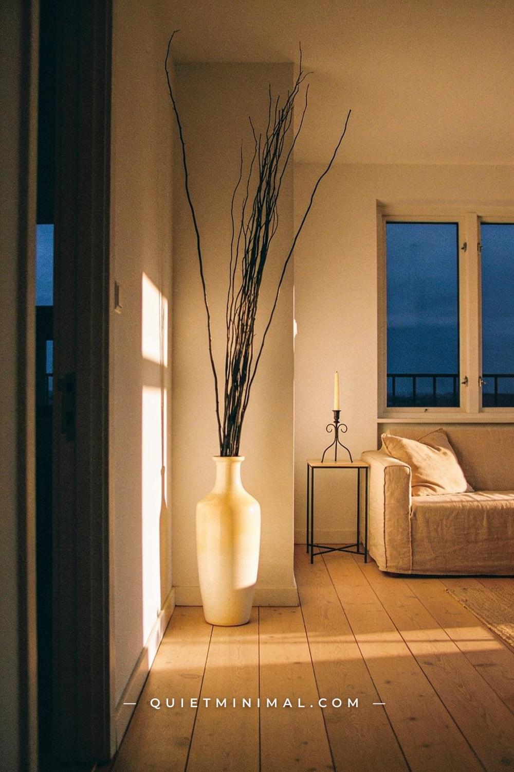 A wide establishing shot from across a small apartment living room