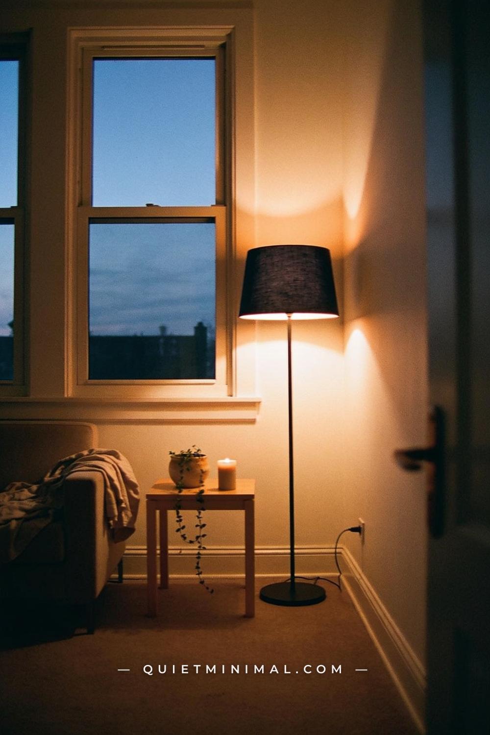 A wide establishing shot from the corner of a small apartment living room
