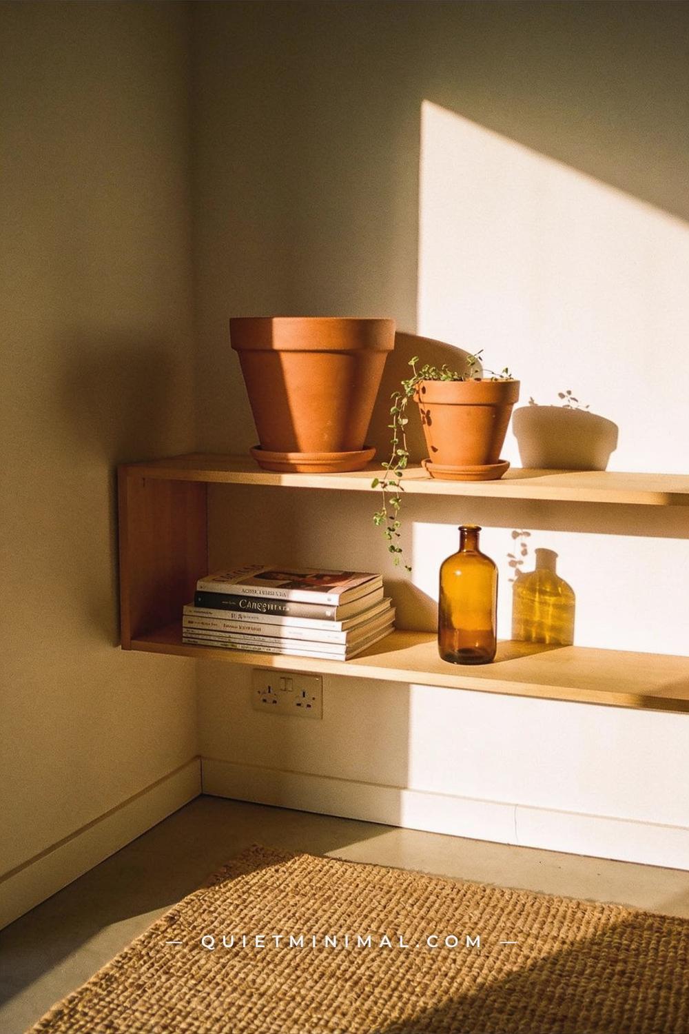 A wide establishing shot from across a living room taken from a corner vantage near a bookshelf