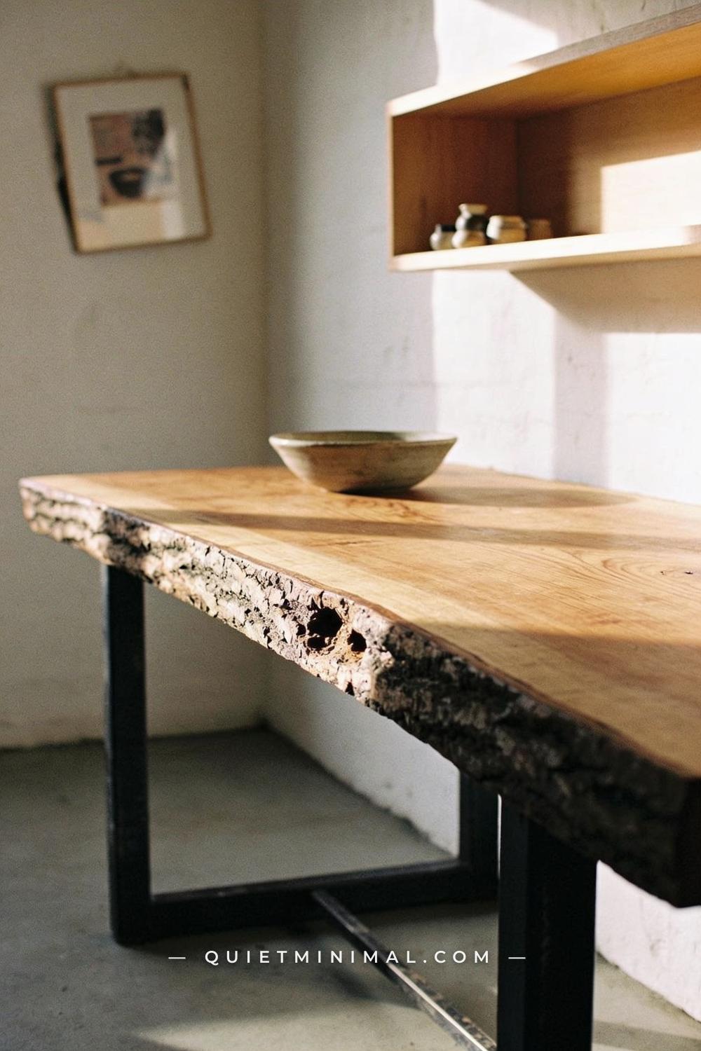 A medium-wide corner view of a wabi-sabi kitchen island top showing an extremely thick reclaimed Douglas fir slab approx