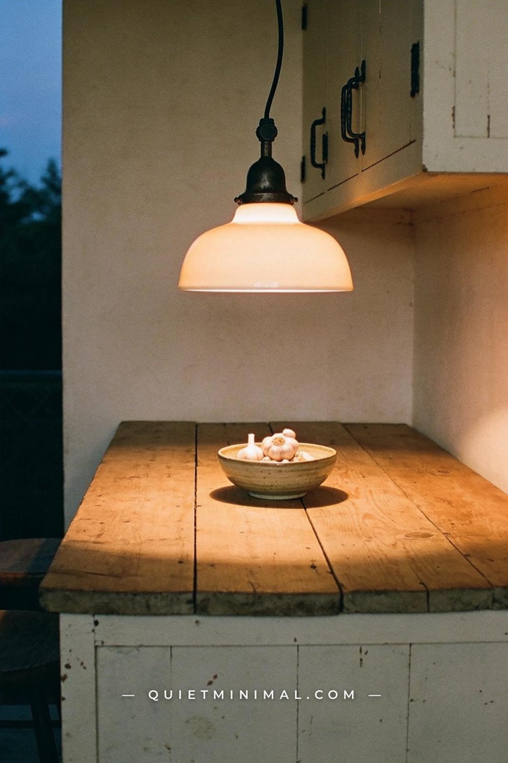 A medium-wide straight-on view of a wabi-sabi kitchen island from the seating side